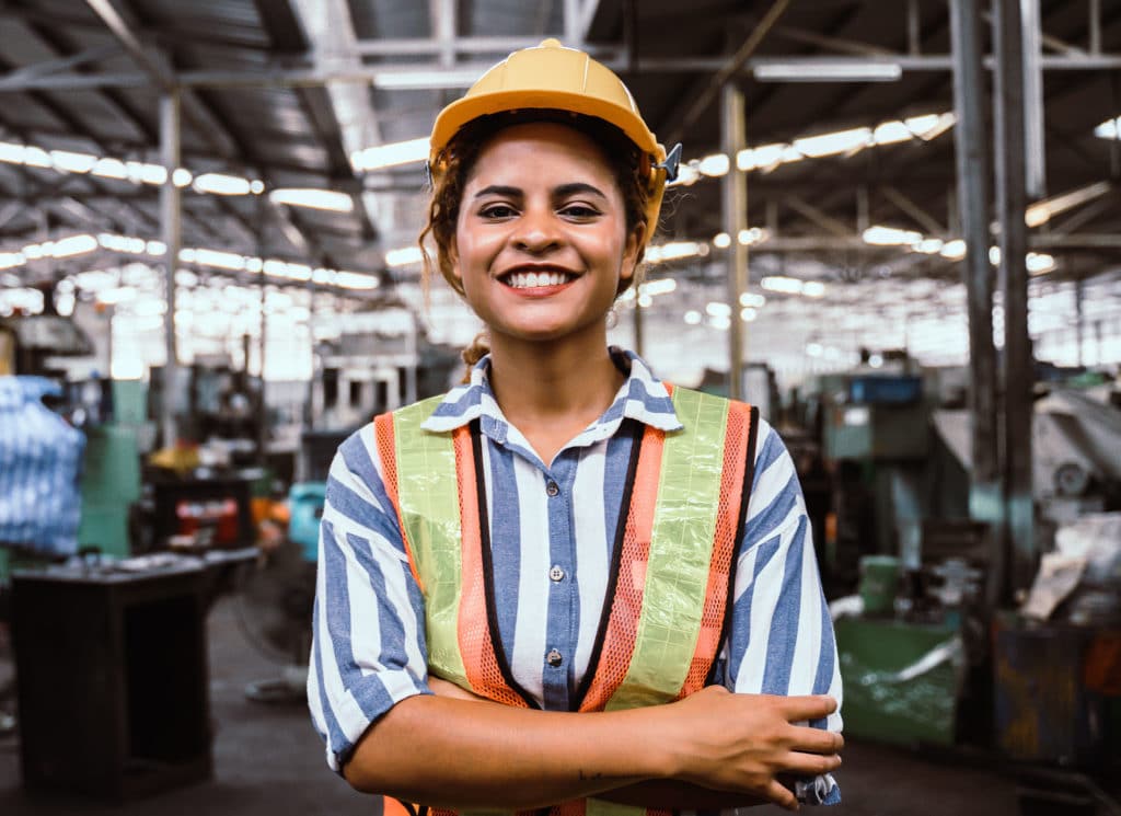 Young female worker in the factory